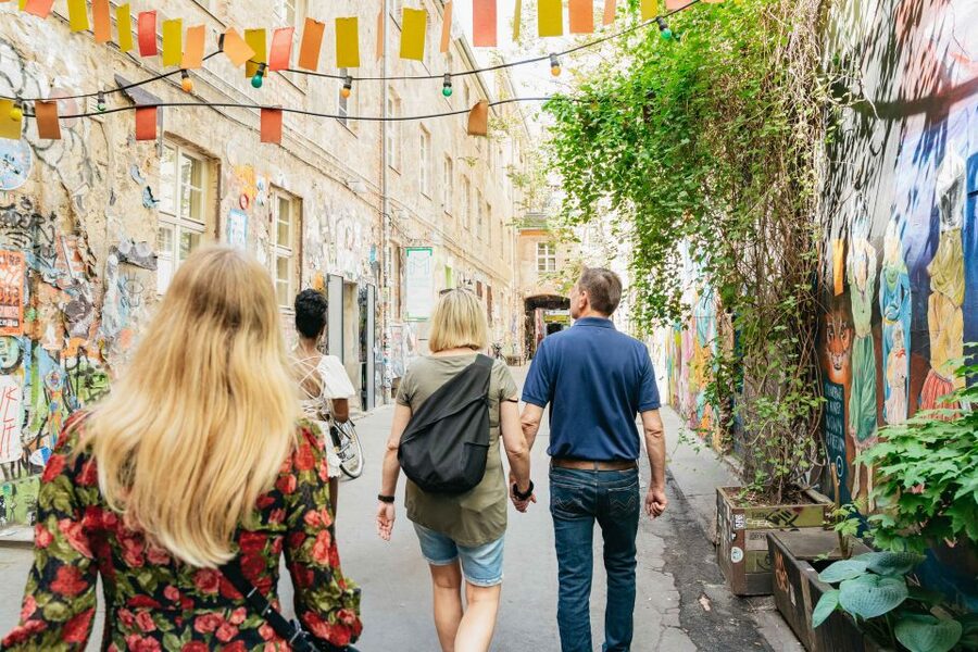 Berlin: Hidden Backyards Guided Walking Tour - Haus Schwarzenberg, art in a rough-edged courtyard
