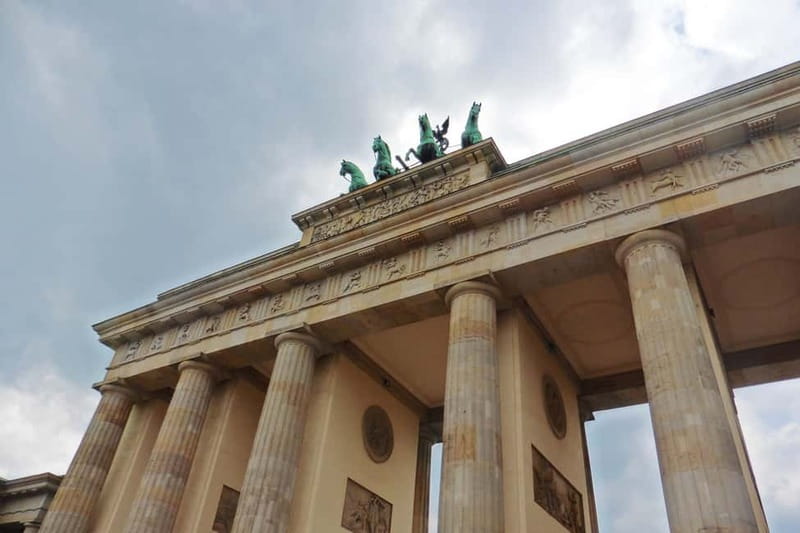 Berlin: Historic Center Walking Tour with a Real Berliner - Arriving at Brandenburg Gate