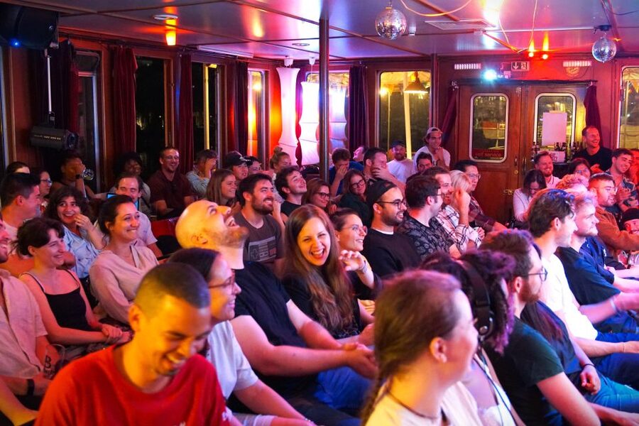 Berlin: Laughing Spree Comedy Show on a Boat - East Side Gallery views before and after the show