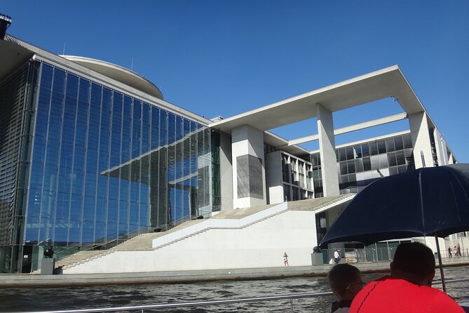 Berlin sightseeing boat tour on the Spree - The Fernsehturm rises above Mitte